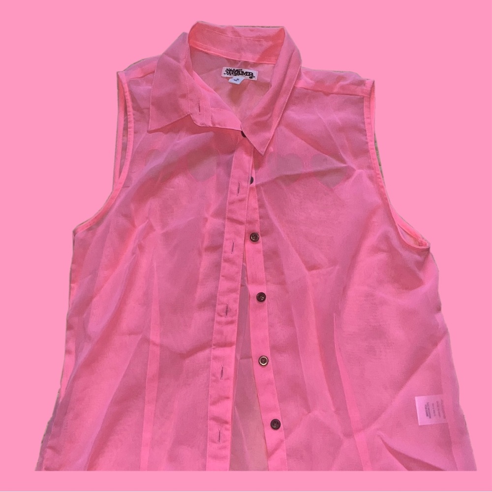 pink blouse with heart cutouts